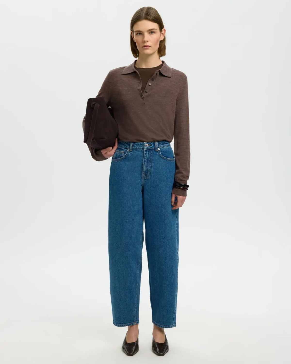 Polo in maglia di lana merino a maniche lunghe