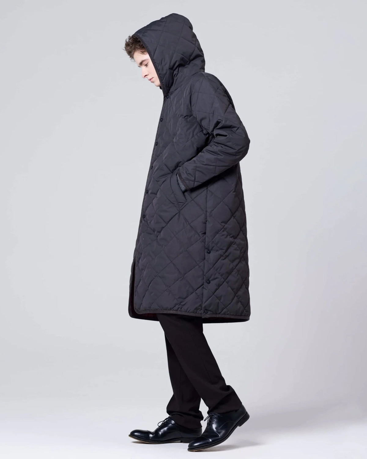 Cappotto giacca imbottito con cappuccio e profili piping unisex