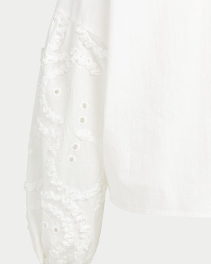 Blusa con maniche ricamate e scollo rotondo