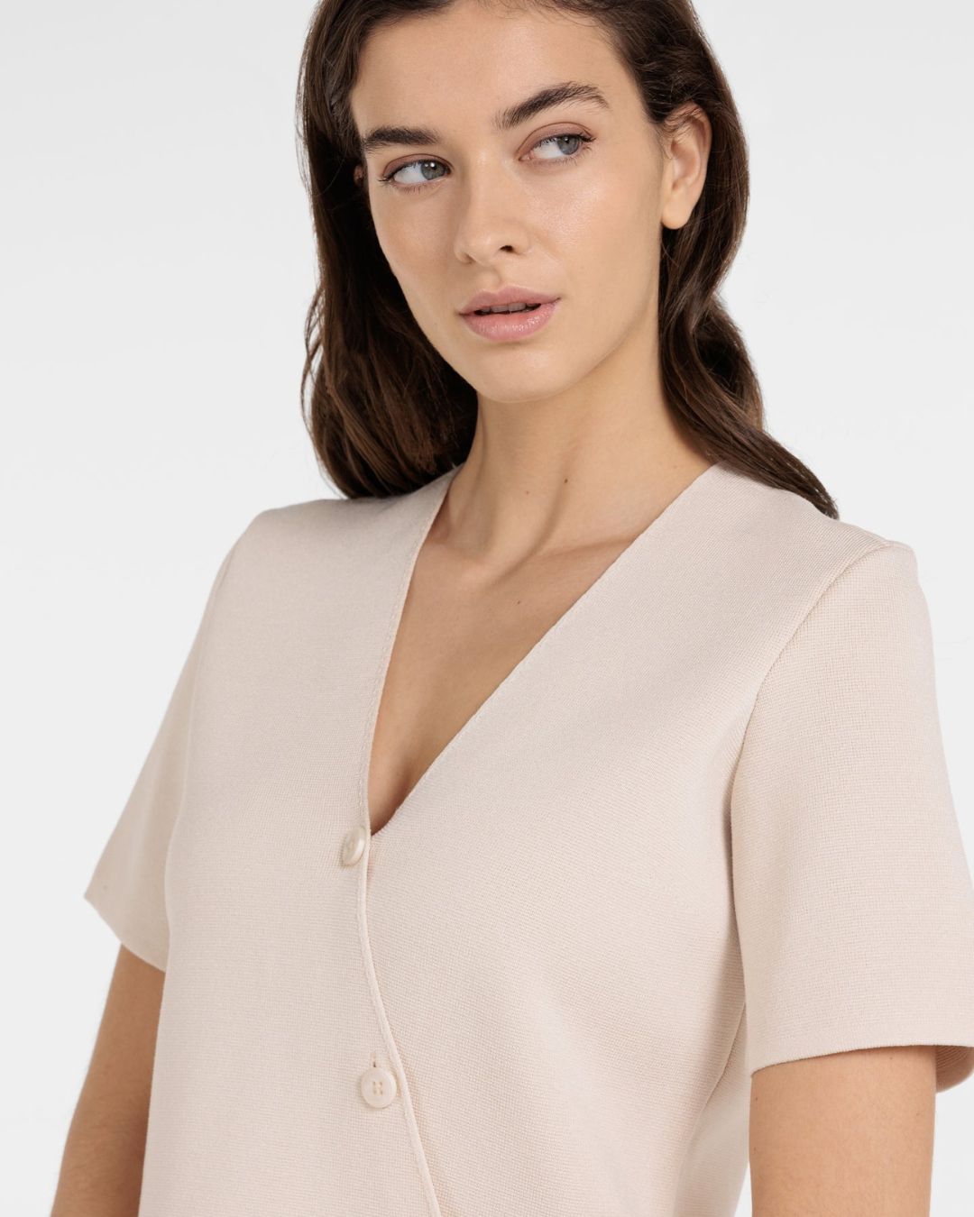 Top in maglia fine con scollo a V e chiusura asimmetrica