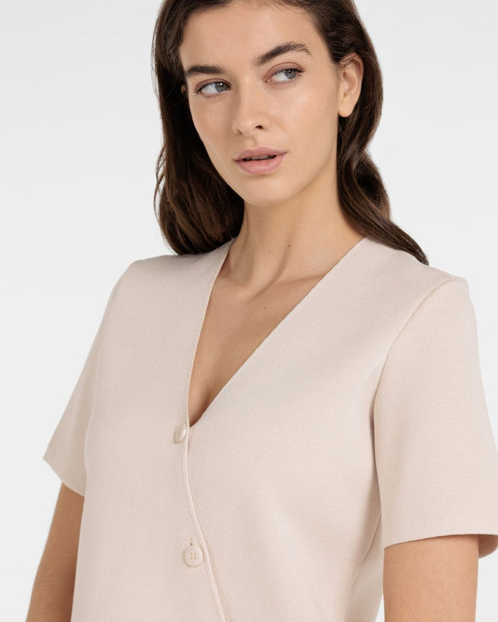 Top in maglia fine con scollo a V e chiusura asimmetrica