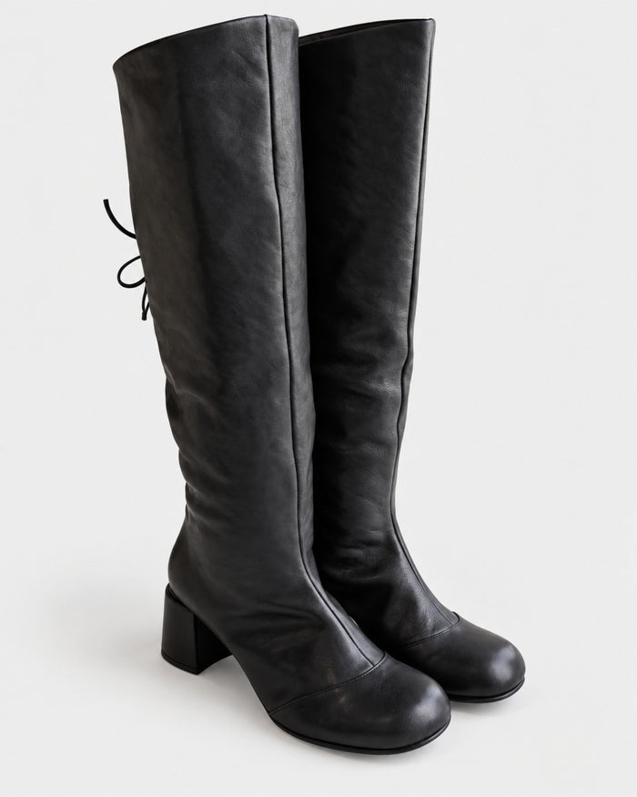 Black leather boot with a medium heel