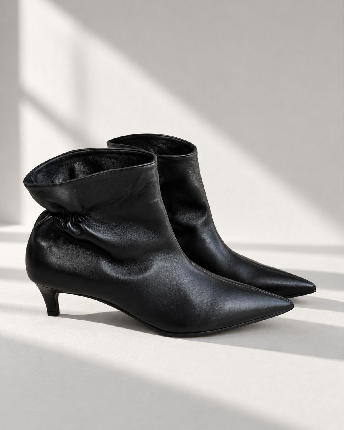 Pleated nappa leather ankle boot with medium heel