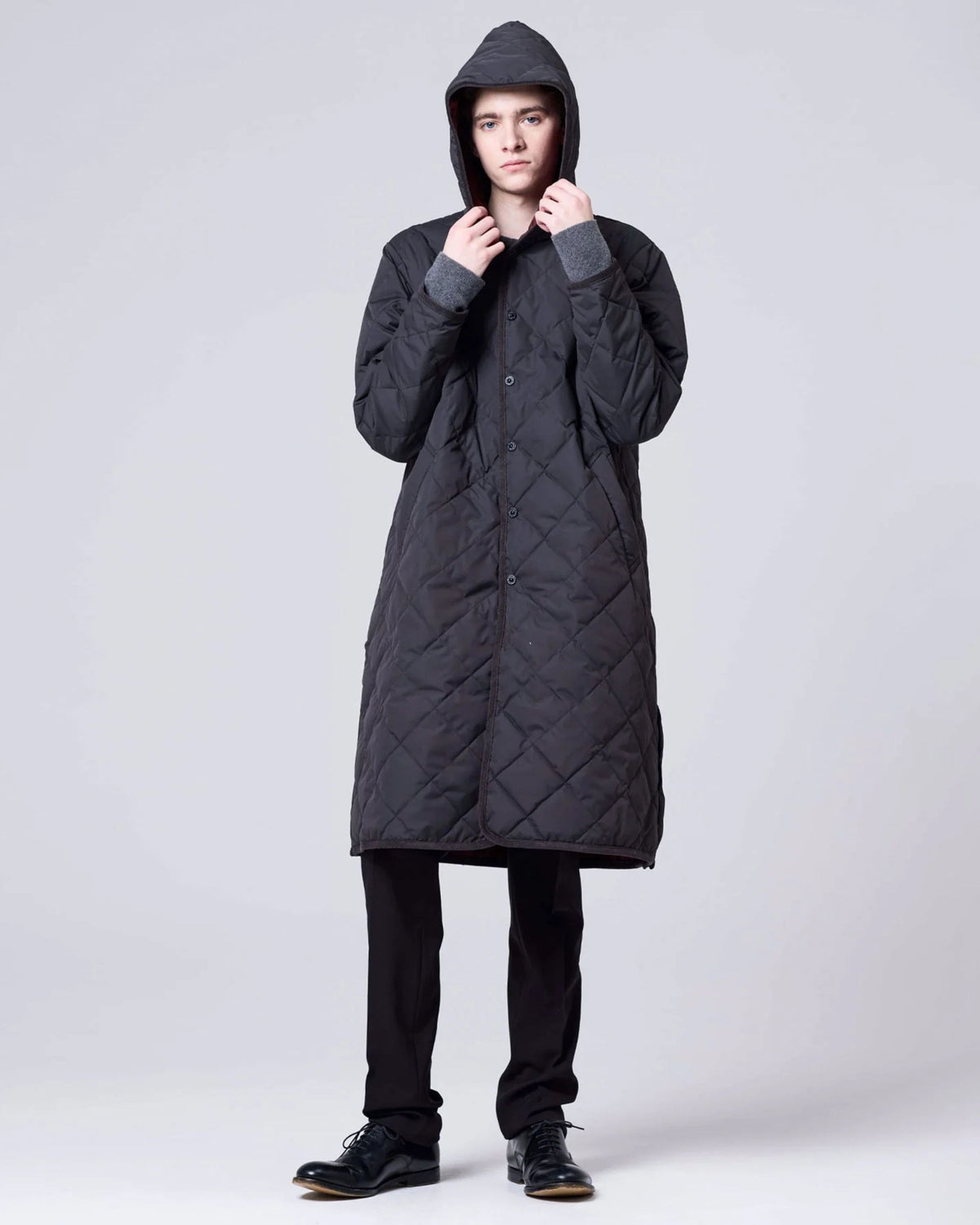 Cappotto giacca imbottito con cappuccio e profili piping unisex
