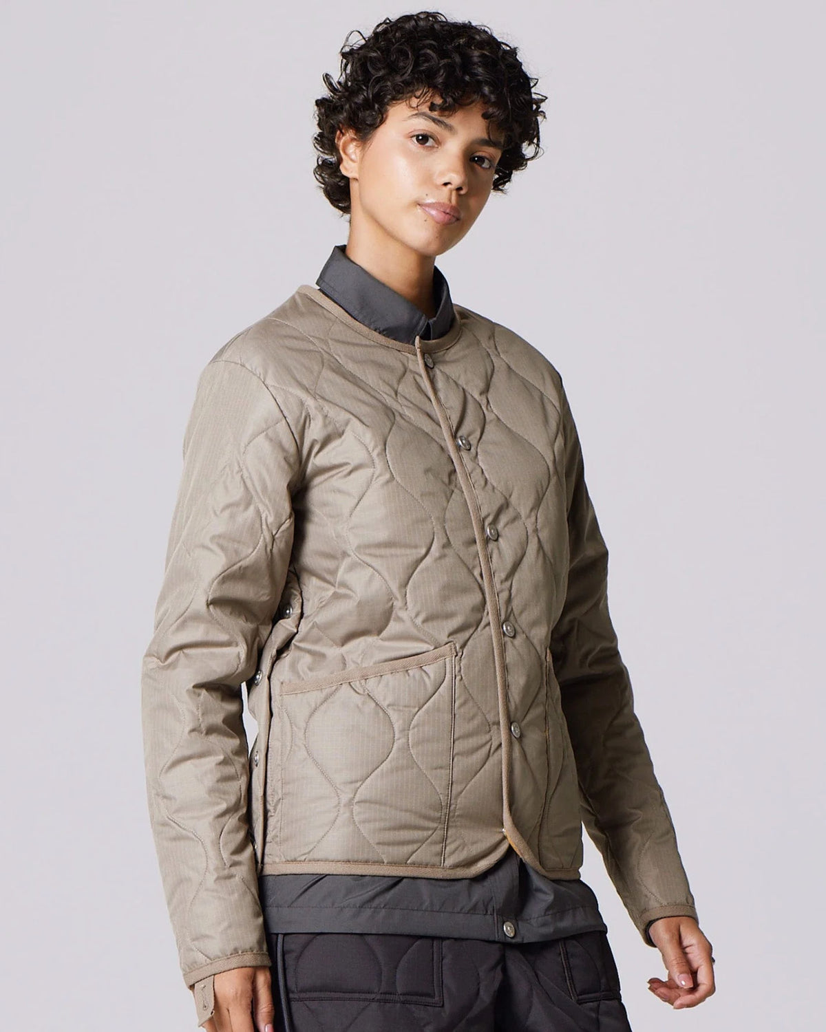 Giacca imbottita unisex con girocollo