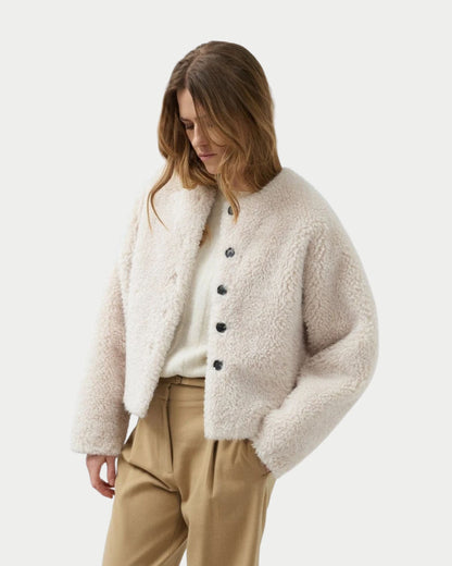 Giacca corta oversize in eco pelliccia