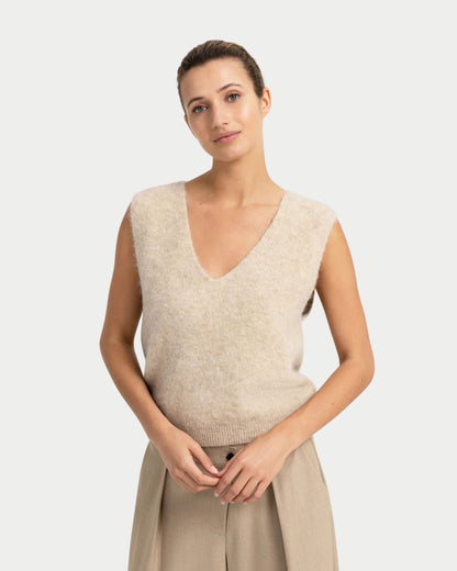 Sleeveless top with deep V-neck