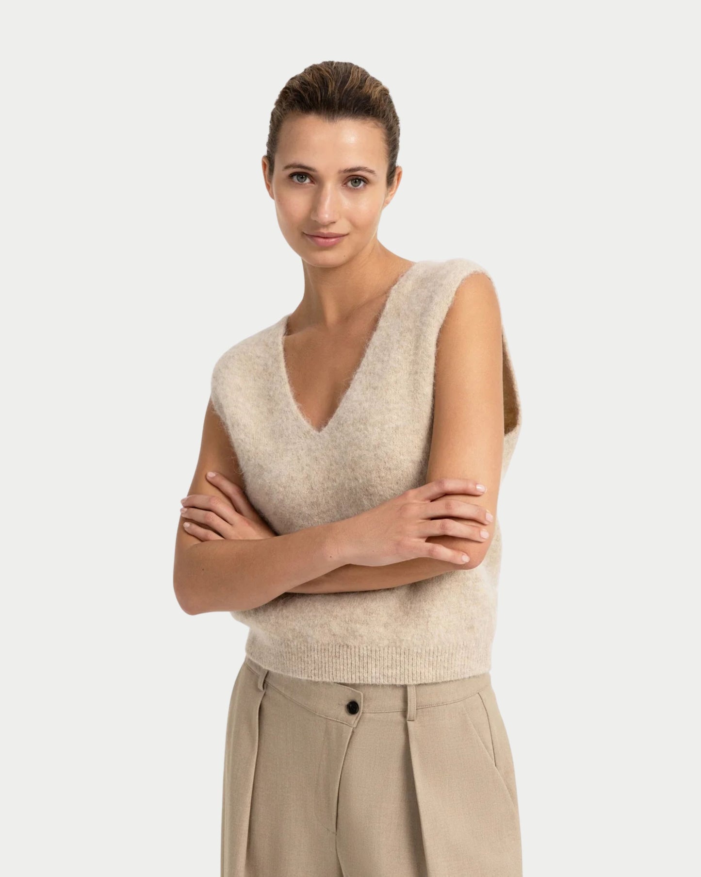 Sleeveless top with deep V-neck